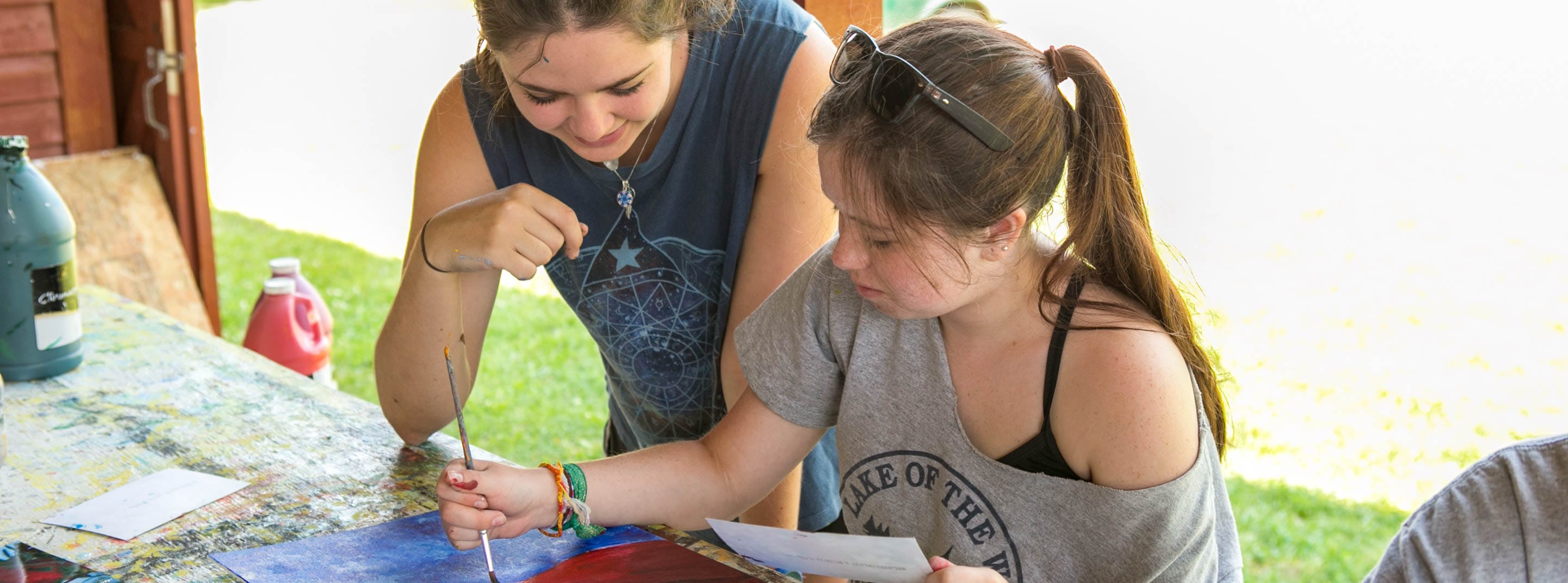 Staff with camper painting